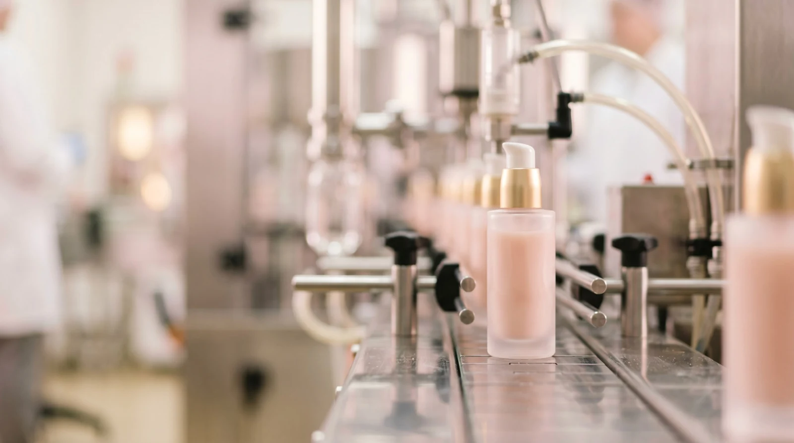 Pump bottles on a cosmetic filling line